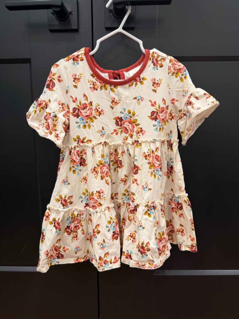 Wildflowers Rust Trim Floral Tunic Top - Cream with Rust, Blue, Green, and Pink.